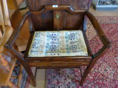 An inlaid piano stool