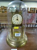 Brass perpetual clock under dome ( pendulum etc. in office)