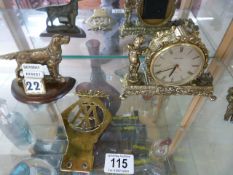 Perpetual Calender depicting hunting dog, brass mantle clock with cherub decoration A/F and a car