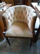A Buttonback bedroom chairx