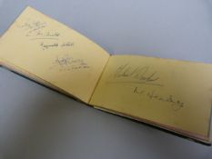 An Autograph book - containing a large quantity of signatures - Gracie Fields and members of Z -