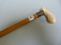 An ivory handled Malacca cane with silver mount