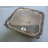 A hallmarked silver serving tray- weight 1024g approx.