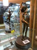 A Small bronze of a nude dancer