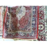 Red ground Kashmir rug