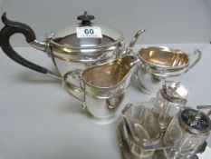 A Mappin & Webb plated tea service and an Art Deco cruet set