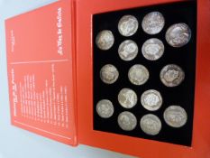 The history of the Peseta, a cased set of 15 silver coins with their information cards