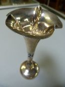 A hallmarked trumpet vase made by Asprey (weighted)