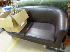 A Leather style two seater sofa