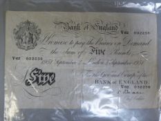 A Bank of England white £5 note, dated 4th September 1951, prefix V62, P.S. Beale- some creasing but