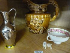 A brown Hound Handle jug, Small Doulton bowl, Wade Whimsie and one other - in aid of Ben