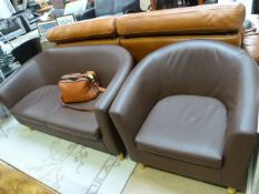A Leather style two seater sofa and a tubchair