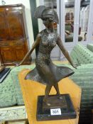 An Art Deco Style Bronze of a Flapper Girl