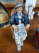 A Royal Doulton figure group "taking things easy" HN2677