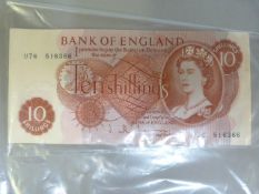 Three Ten Shilling notes, one Scottish £1 note and a Bank of England £1 note