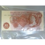 Three Ten Shilling notes, one Scottish £1 note and a Bank of England £1 note