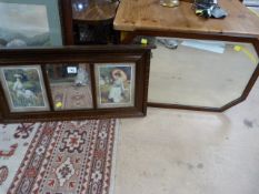 An oak framed mirror and another