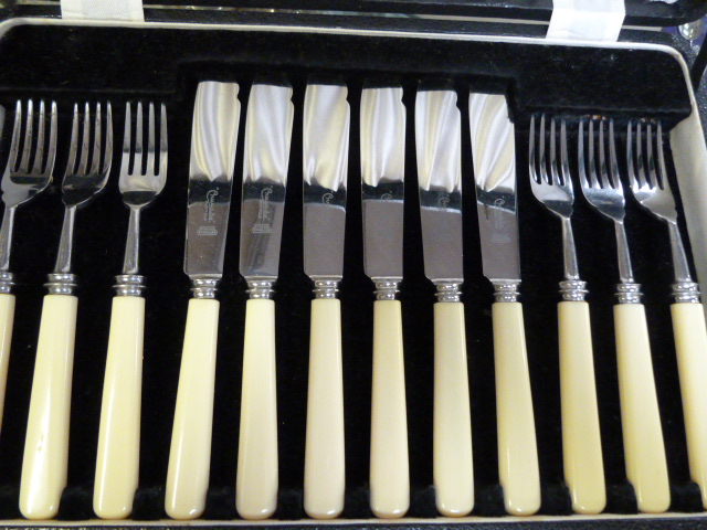 Small quantity of silverplate cutlery and a hallmarked silver mounted set of serving Knives - Image 4 of 4