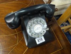 A bakelite style telephone