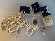 A quantity of various silver chains, pendants etc. ( total weight of silver approx 55g)