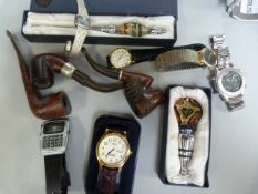 A small quantity of various watches,pipes etc