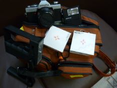 A case containing camera and accessories etc
