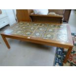 A large tile topped coffee table