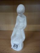 A spode figure of a boy