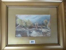A watercolour of a river scene in a Gilt frame - signed Sibly bottom right