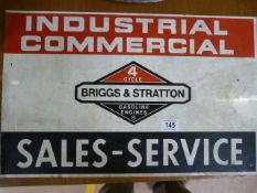 A Briggs and Stratton double sided metal advertising sign