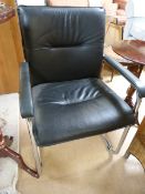 A Black leather office chair