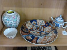 An early Japanese teapot a famille rose ginger jar ( No lid), two Imari chargers and a tea bowl A/F
