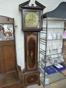 A mahogany cased longcase clock with inlay. the brass faced dial signed Lindall- pendulum and
