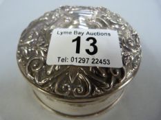 A hallmarked silver pot