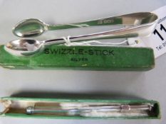 A hallmarked silver swizzle stick and a pair of silver sugar tongs