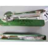 A hallmarked silver swizzle stick and a pair of silver sugar tongs
