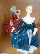 A pair of Royal Doulton figures of 'Janine' and one other 'Autumn breezes'