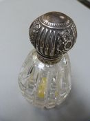 A hallmarked silver topped scent bottle