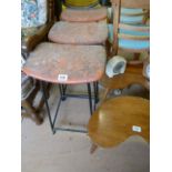 A Set of three retro bar stools