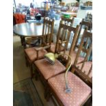 An Ercol table and six chairs