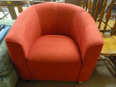 A Red upholstered tub chair