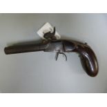 A double barrelled flintlock pistol- damage to stock