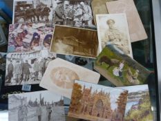 A small quantity of postcards, including WWI scenes