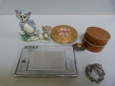 A pair of Tom and Jerry Wade figures, compact, card/lighter case etc