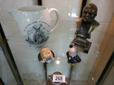 A Copeland Spode commemorative jug of Winston Churchill, a bust and two Churchill character pots