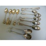 A quantity of oriental coffee spoons, A Tiffany & Co silverplated butterknife etc