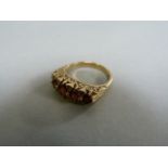 A garnet five stone ring size M- total weight 5.5g