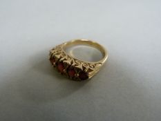 A garnet five stone ring size M- total weight 5.5g