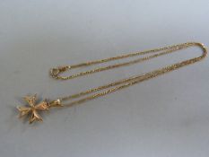 A hallmarked 9ct gold Maltese cross on chain- total weight 2.6g