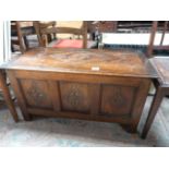 A carved oak chest